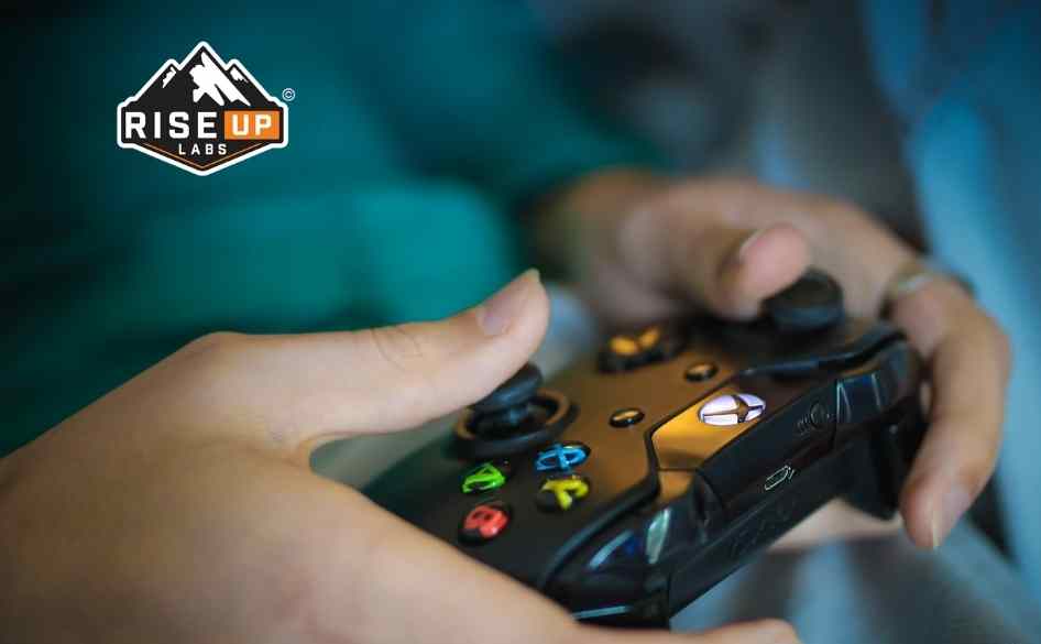 girl with console playing a game