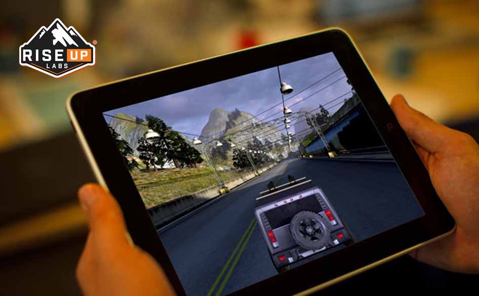 a person playing a game on tab showing road with a car
