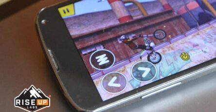 bike racing game in mobile phone on a table