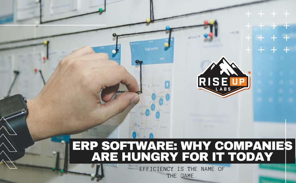 man pinning a map picture on the board