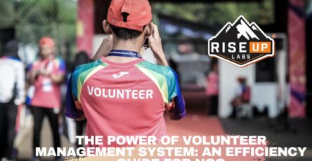 a boy with a volunteer red t-shirt and red cap