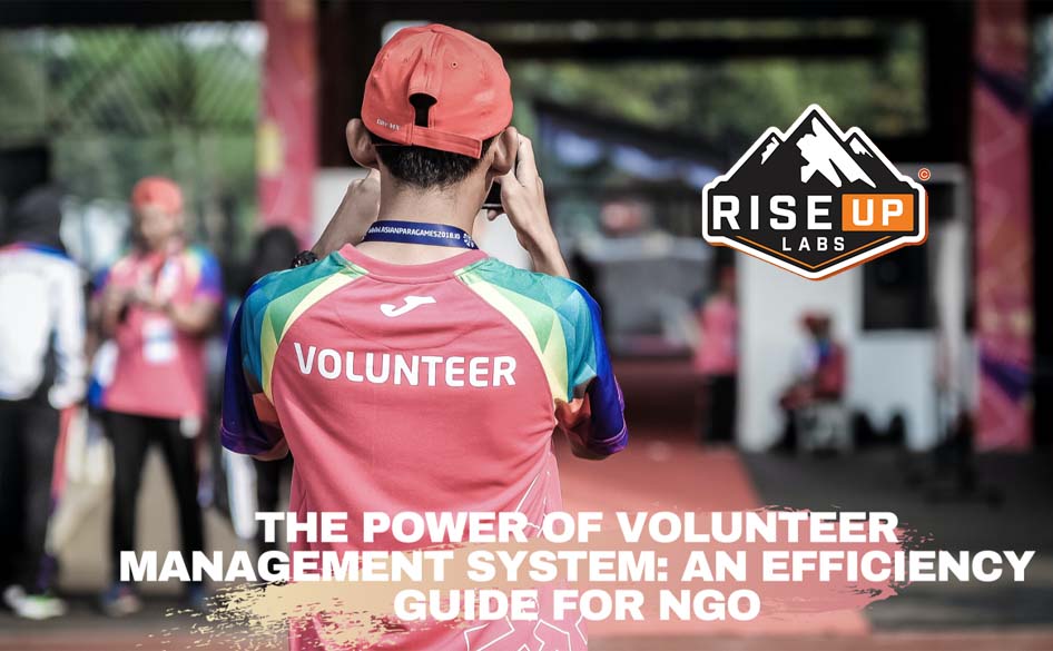 a boy with a volunteer red t-shirt and red cap